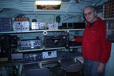Art giving a tour of the radio room on the sub