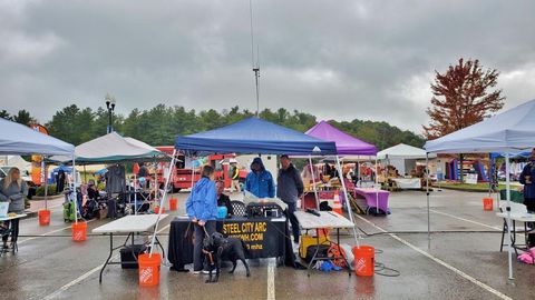 A very wet SCARC crew at Courier Township community days